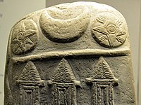The solar symbol of Shamash (right) on a kudurru, with the star of Ishtar on the left and a crescent of Sin.