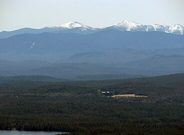 The Adirondack High Peaks from St. Regis Mountain. Mount Marcy is just left of center, Algonquin Peak is to the right