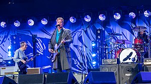 Them Crooked Vultures performing at the Taylor Hawkins tribute concert in September 2022; from left to right: John Paul Jones, Josh Homme, Dave Grohl