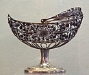 Sugar as a luxury item was often displayed in expensive items such as this 1810 silver filigree basket