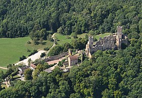 A 2012 aerial view of Rötteln Castle in ruins. There are two parts to the castle, each surrounded by a wall and each at different elevations.