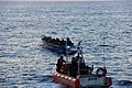 A Robert Yered small boat crew approaches a 30-foot panga vessel with 50 Haitian migrants aboard approximately 46 miles north of Cap Haïtien, Haiti, May 20, 2019.[12]