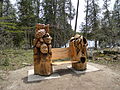 A sculpted bench on the Lake trail