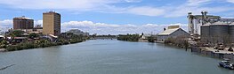 Iloilo River with Iloilo Provincial Capitol in the far background