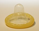 A rolled-up condom