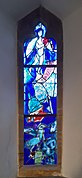 Window 6, angel with harp, bird, and donkey