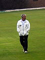 Barrie Leadbeater standing in his last first-class match