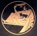 Interior of a red-figure kylix depicting kottabos players. Signed by Pamphaios, c. 510 BC. Louvre (CA 1585).