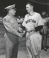Earl Johnson, who served with the 30th Infantry Division, is presented with the Belgian Citation, for his service in Europe during World War II, by Major General Leland Hobbs.