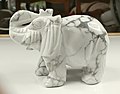 Elephant carved from howlite. Length 10 cm (4 in).