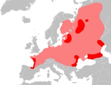 Carte d'Europe représentant en rose clair l'aire de distribution historique qui s'étend de l'Oural à l'océan atlantique.
