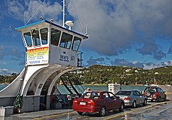 Ferry between Opua and Okiato, Bay of Islands, New Zealand, with Opua in the distance