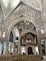 A view of the nave over the organ. Wall fresco by Nicholas Untersteller.