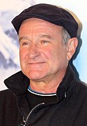 Robin Williams interprète Simon Roberts.