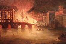 Burning buildings on the River Thames