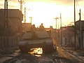 An M1A1 Abrams Main Battle Tank from A Company, 1st Battalion, 77th Armor Regiment destroys an insurgent vehicle in Baghdad, Iraq in 2007