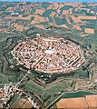 Image 19Palmanova, Italy, constructed in 1593 according to the defensive ideal of the star fort, today retains its distinctive geometry. (from History of cities)