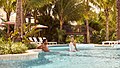 Couple in the lazy river at Harborside Pool Club at The Boca Raton