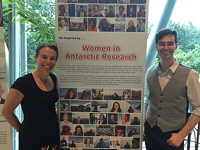 Strugnell and Shafee in front of conference promotional banner at SCAR 2016