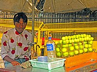 A Shikanji lemonade seller, outside Red Fort, Delhi, India.