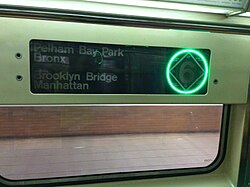 R62A LED destination sign set to a green circle (for local trains)