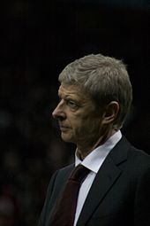 Arsène Wenger in suit and tie