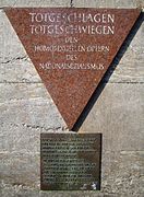 In the Berlin Nollendorfplatz subway station, a pink triangle plaque honors gay male victims.^