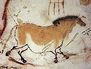 Image of a horse colored with yellow ochre from Lascaux cave.