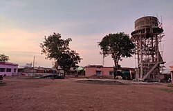 View of the Linga water tower from the village's main road