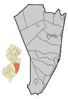 Location of Barnegat Light in Ocean County highlighted in red (right). Inset map: Location of Ocean County in New Jersey highlighted in orange (left).