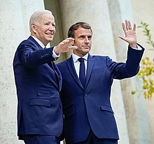 President Biden and French President Macron stand in front of a villa in Rome, where they met each other to discuss the nuclear deal between Australia, the US and the UK.