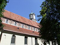 Hochchorwände aus Sichtbackstein, kleine Obergaden mit Nur-Bahnen-Maßwerk, keine Strebebögen