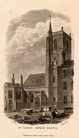 Monochrome print of St James' church from c.1838. The image shows the church from the south east aspect in the background, with the graveyard (the site of St James' Fair) in the foreground. In the graveyard can be seen a mother with three children standing at a grave.