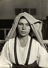 Lewis Wickes Hine, Woman with Folded Headdress, Ellis Island, NY, 1905