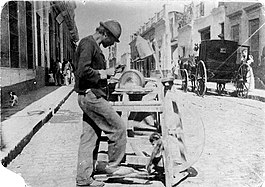 Scissors grinder ("Afilador") with grinding cart in Buenos Aires, 1870