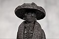 Detail of a Catrina figure in Barro negro pottery by artisan Carlomagno Pedro Martinez