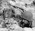 Soldier uses an EE-8 field telephone