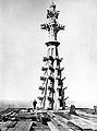 The peak of the north tower, with a man beside it, for scale. The photo was taken in 1881.