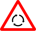 7i) — Roundabout ahead