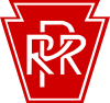 White letters "PRR" on keystone-shaped, red background