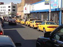 Taken on March 1, 2014. Taxis waiting to pick up passengers with large packages in the Getty Square Shopping District, Yonkers, New York.