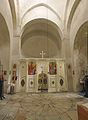 Interior of the church with the white iconostasis