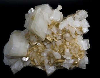 Magnésite (jaune) avec dolomite - Espagne (10,2 × 6,7 cm).