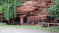 Entrances to man made caves at the back of the Queen's Head car park in Wolverley