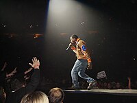 Kanye West performing for U2's concert.