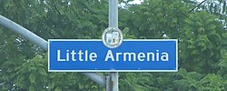 Little Armenia neighborhood sign located at the intersection of Normandie Avenue and Santa Monica Boulevard