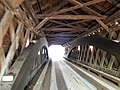 Looking through the bridge, showing the truss and arch structure