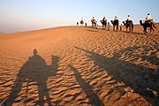Camel ride in the Thar Desert near Jaisalmer, India