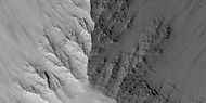 Close view of layers in the Louros Valles, as seen by HiRISE under HiWish program; this is an enlargement of a previous image.