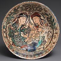 Persian mina'i ware bowl with couple in a garden, around 1200. These wares are the first to use overglaze enamel decoration.